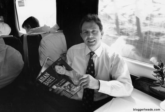 13 Jan, 2003 - Tony Blair enjoys some light reading...
